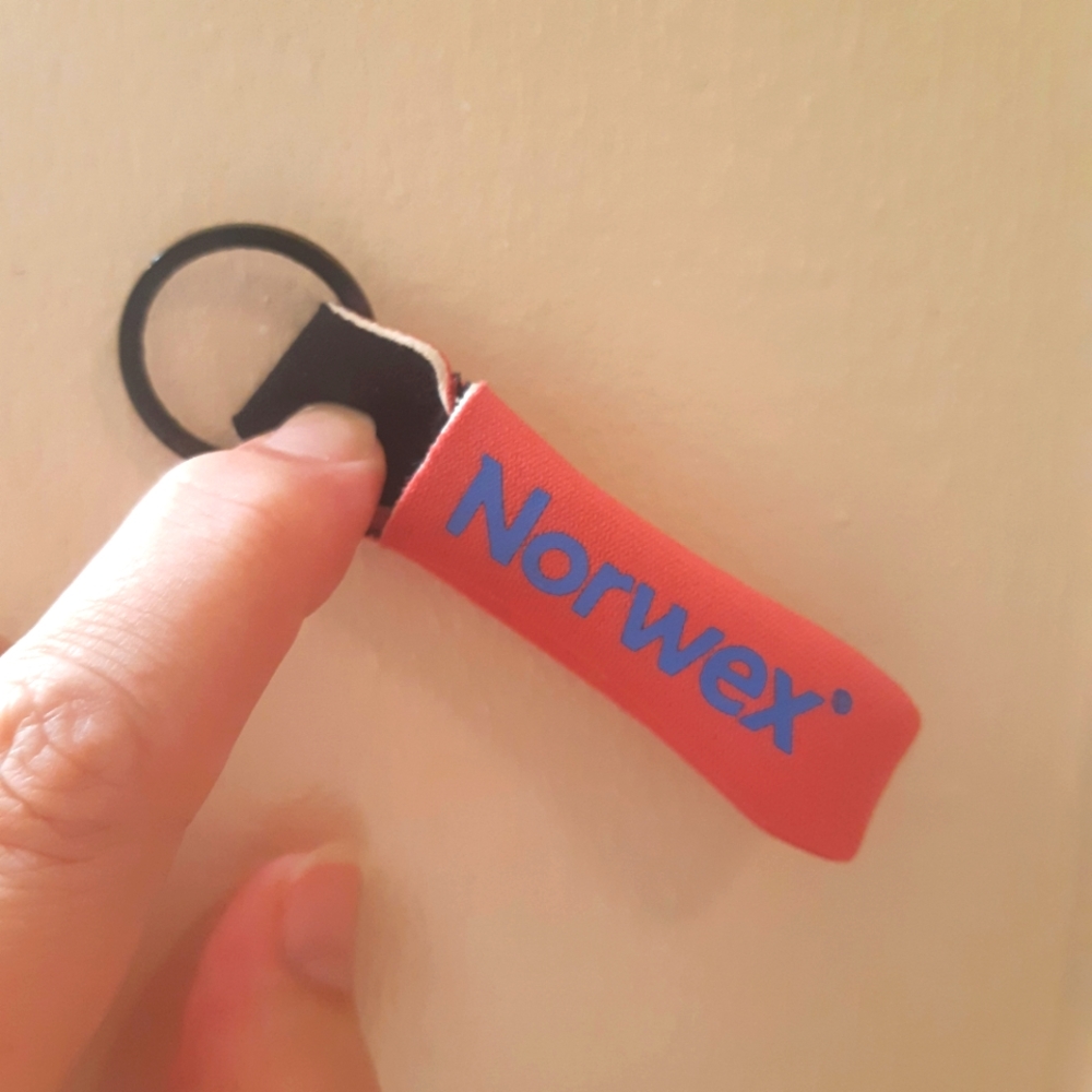 Norwex keychain with lip balm holder.